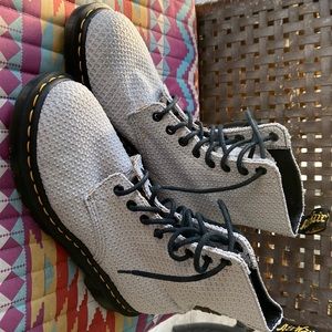 Dr. Martins gray waffle fabric bouncing soles.